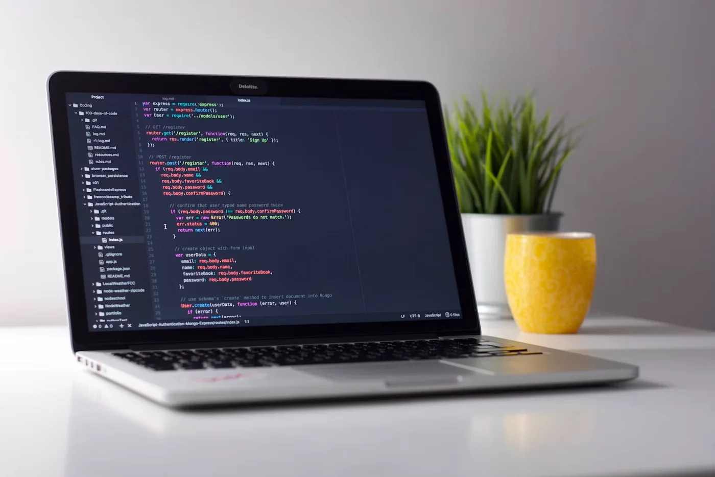Laptop screen showing programming code representing top computer science universities in USA